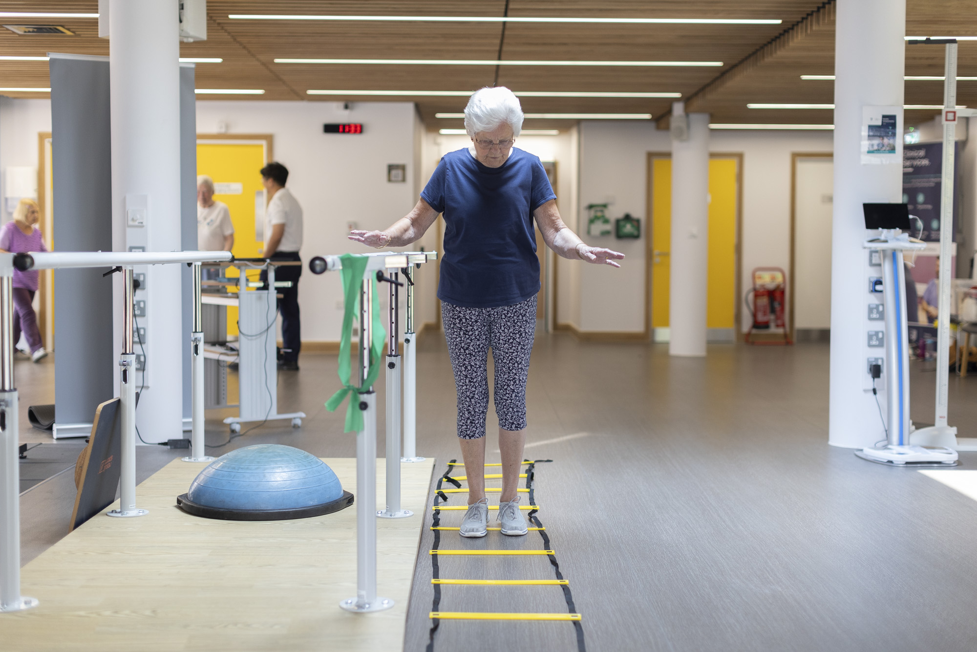 patient walking unassisted and completing balance exercise